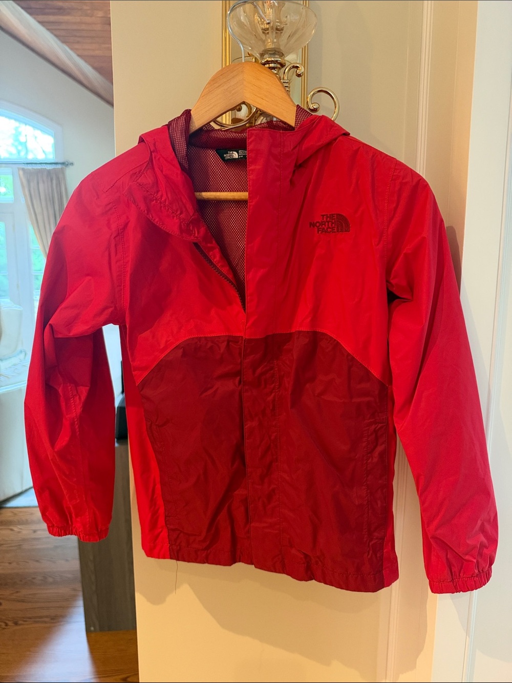 The North Face Kids Red Hooded Rain Jacket with Dark Red Accent
